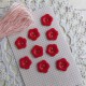 9 boutons rouges - fleur