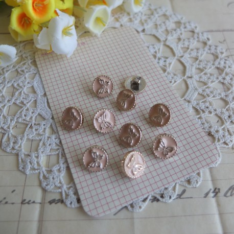 10 boutons beige papillons